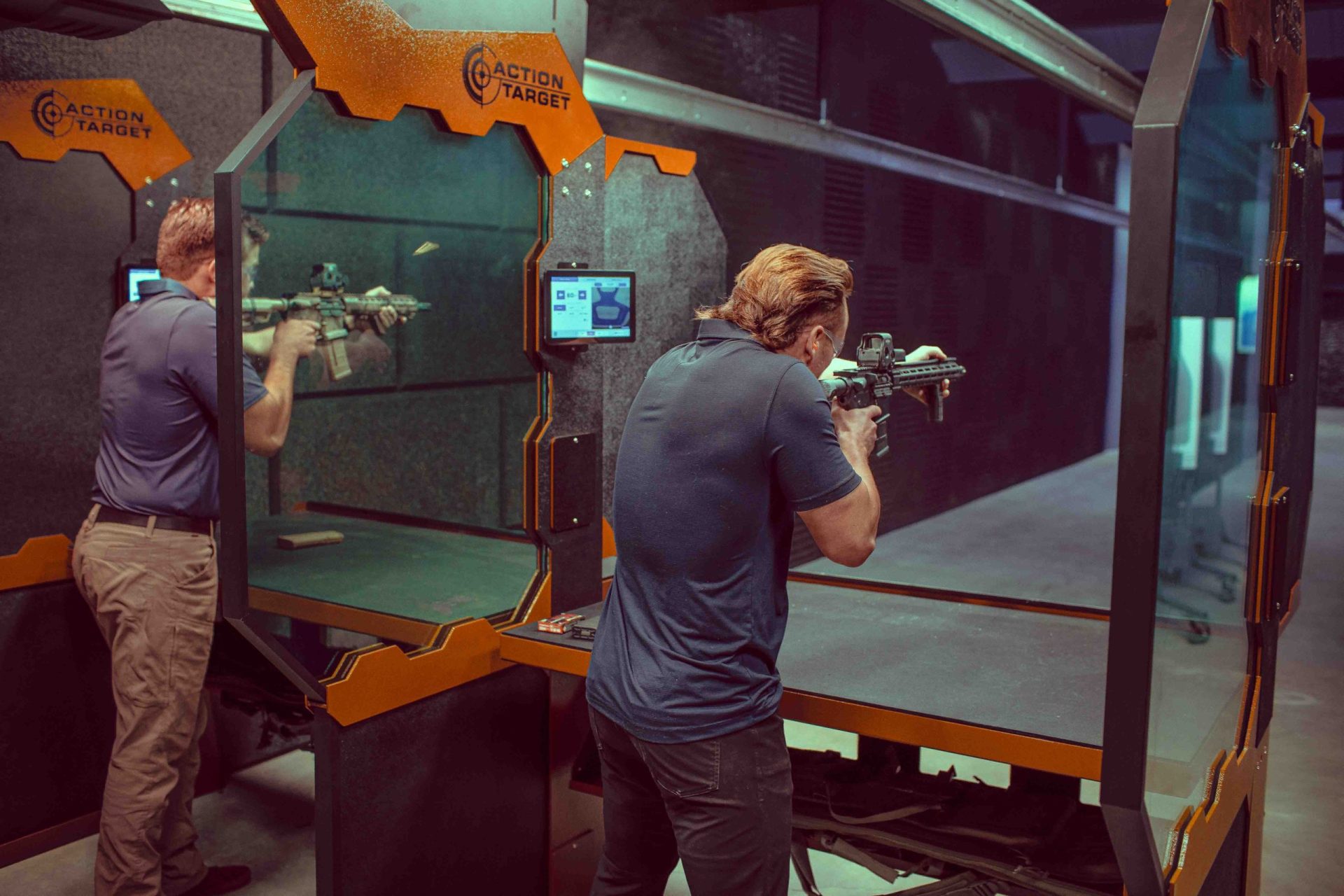Two men shooting at a private gun range