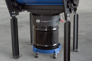 A black industrial drum on casters, labeled 