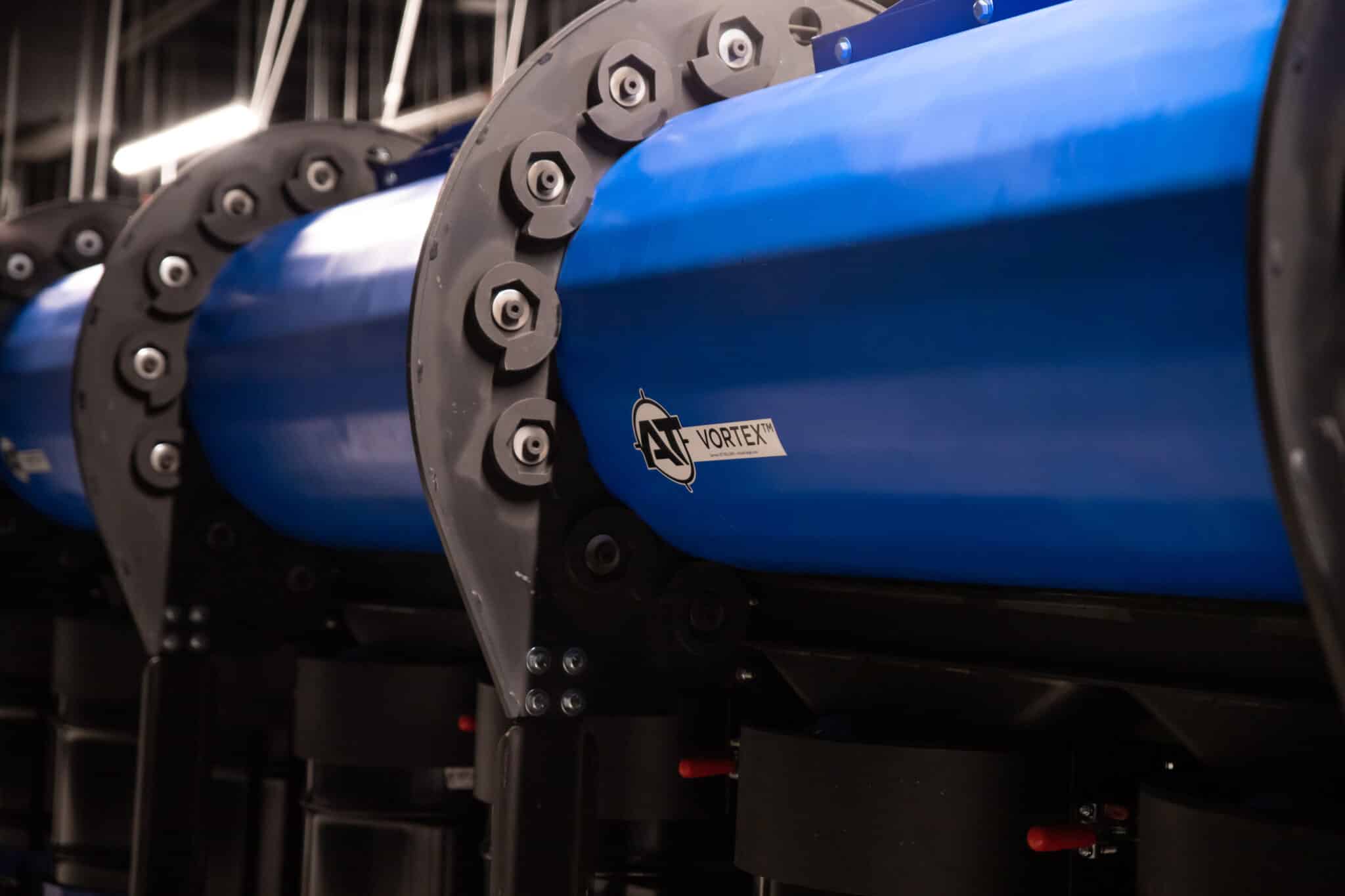 Blue cylindrical machinery labeled