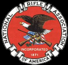 National Rifle Association of America logo featuring a bald eagle holding crossed rifles over a red background.