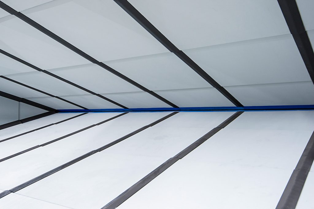 Close-up angle of the Total Containment Trap's deflector plates and mouth