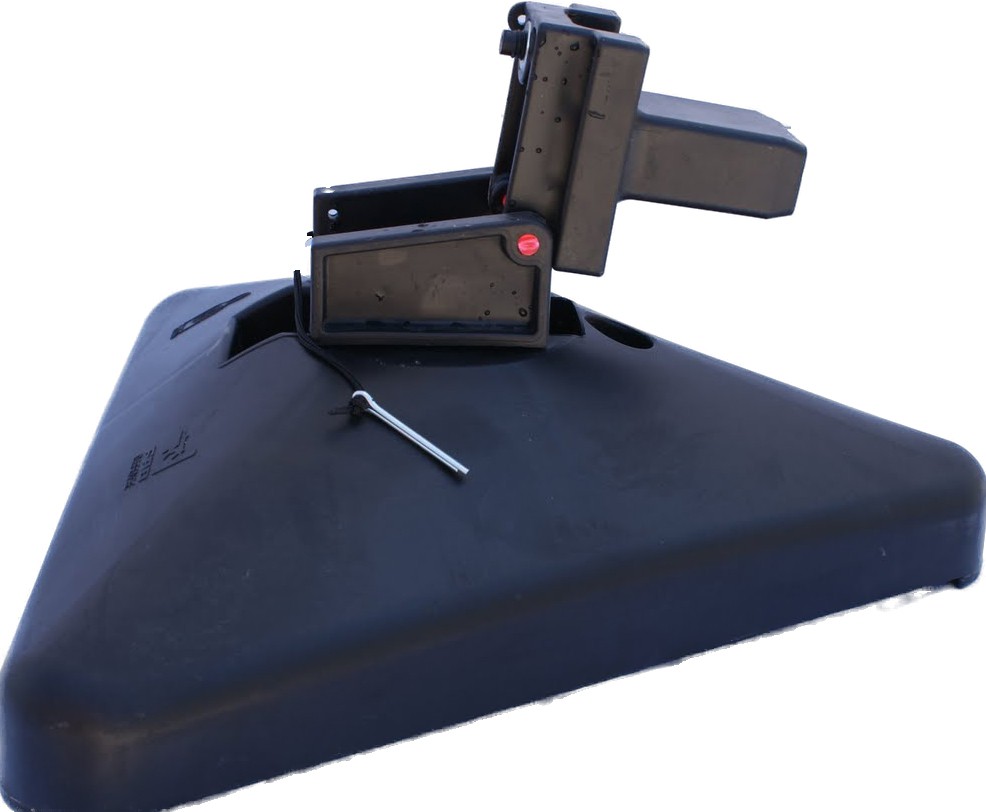 Reactive Target System - Smart Joint Black metal boot on triangular base, pin inserted; used for securing vehicles.