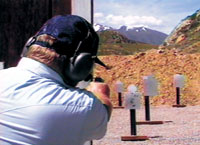 Man Shooting Bobbers Over Shoulder