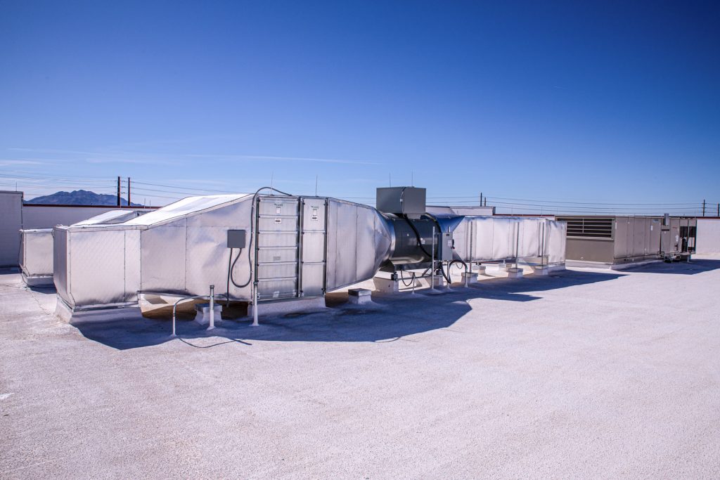 A recirculation ventilation system on top of a commercial range