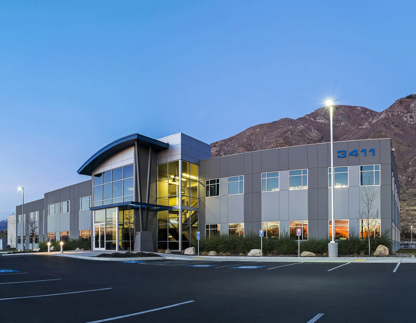 The Action Target headquarters building with the numbers 3411 in a panoramic photo.
