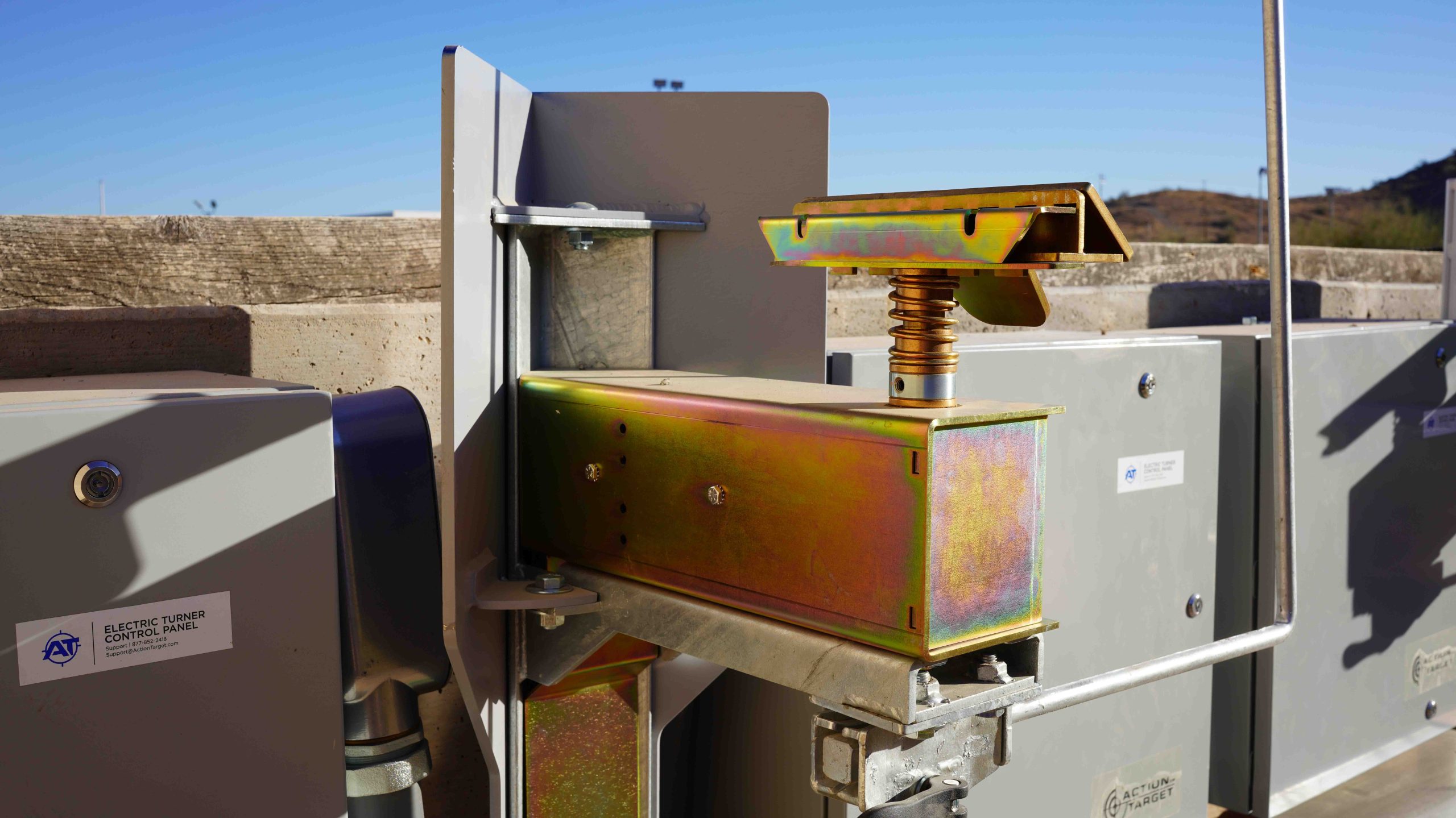 Close-up of outdoor electric target turner system with control panel