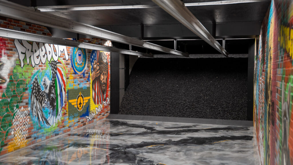 Painted mural inside an indoor shooting range