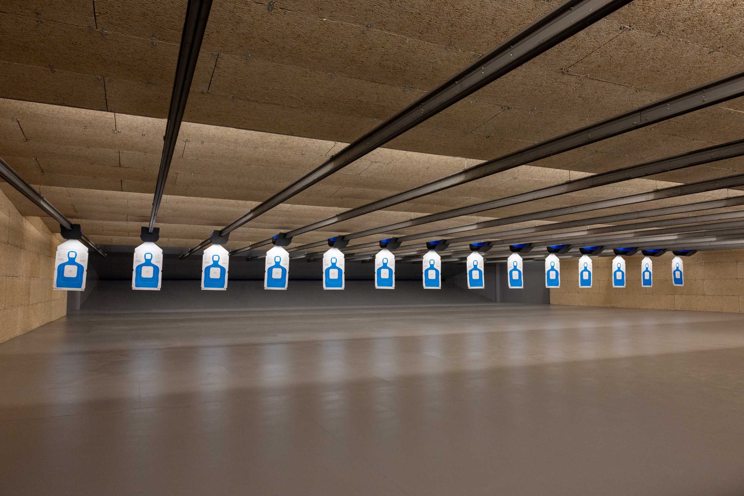 Paper targets hanging inside a modular shooting range