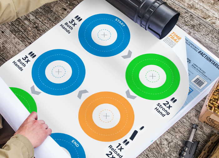 A paper target being rolled out to be shot